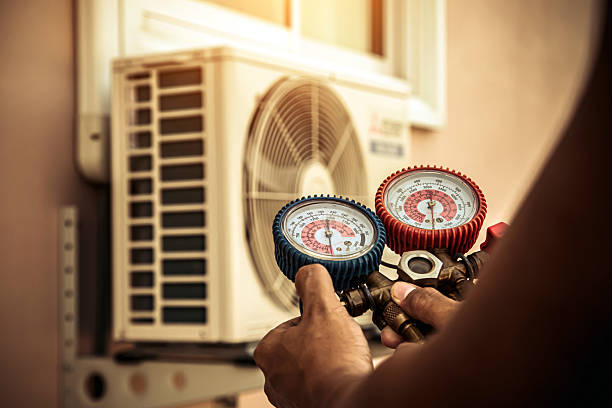 Professional Air Conditioning Service technician working in Purcellville, VA